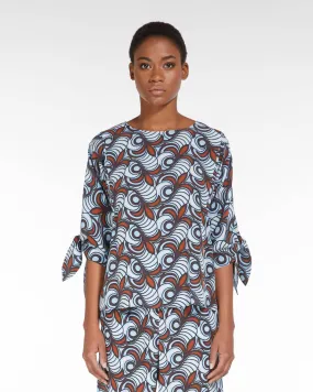 Blusa in crêpe de Chine di pura seta a stampa a fantasia foliage azzurra e coccio con maniche tre quarti con fiocchetti